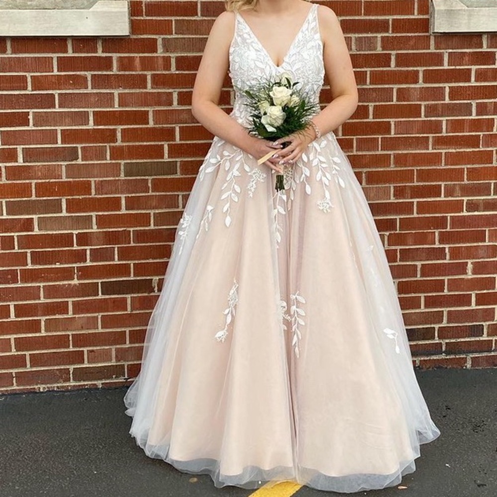 Prom Dress worn for a few hours. Bought brand new and been kept in garment bag.